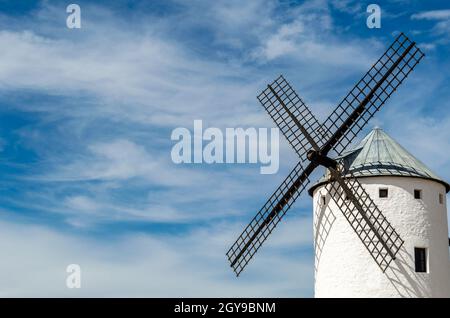 Typical windmill in Campo de Criptana, Spain, on Don Quixote Route, based on a literary character, it refers to the route followed by the protagonist Stock Photo