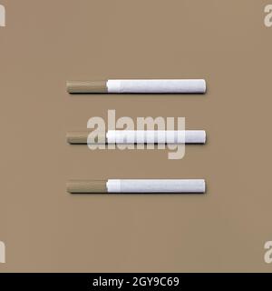 Photo of three cigarettes. Top view. Flat lay. Stock Photo