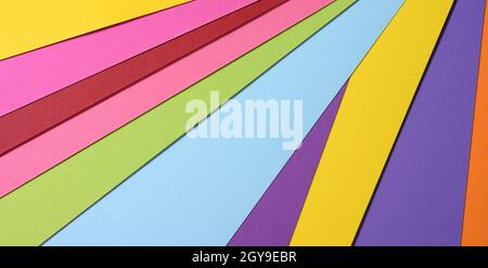 abstract bright background from multicolored paper, backdrop for designer, copy space Stock Photo