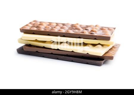 Chocolate bars with hazelnuts isolated on white background. Stock Photo