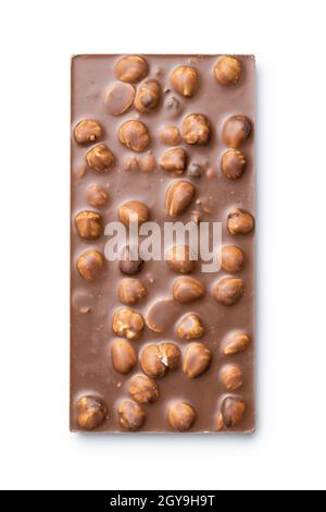 Chocolate bar with hazelnuts isolated on white background. Stock Photo