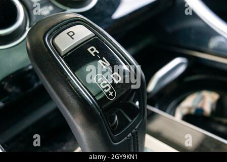 Automatic gearshift lever detail macro shot with selective focus Stock Photo
