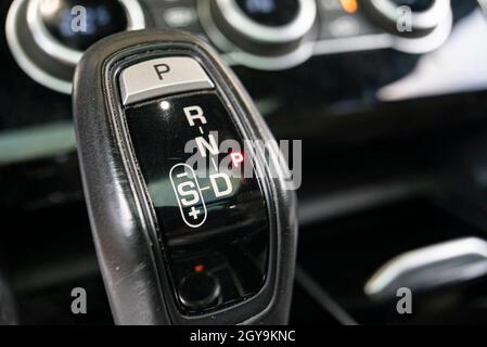 Automatic gearshift lever detail macro shot with selective focus Stock Photo