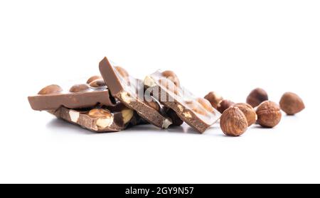 Nutty chocolate with hazelnuts isolated on white background. Stock Photo