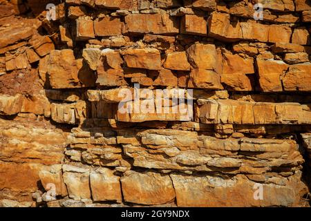Surface, background, texture of a rock with a brownish-red tint Stock Photo