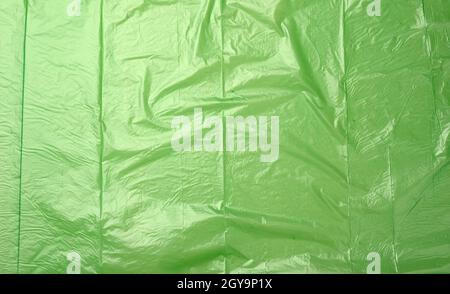 crumpled green polyethylene texture, close up, full frame Stock Photo