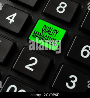 Writing displaying text Quality Management, Internet Concept overseeing and maintain a desired level of excellence Creating New Word Processing Progra Stock Photo