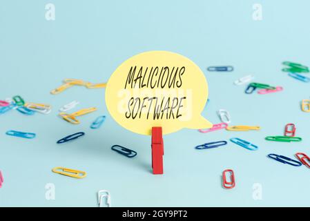 Hand writing sign Malicious Software, Business showcase the software that brings harm to a computer system Colorful Office Supplies Bright Workplace S Stock Photo