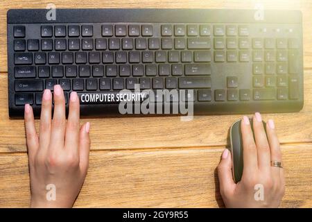 Text showing inspiration Computer Security, Conceptual photo protection of computer systems from theft or damage Hands Pointing Pressing Computer Keyb Stock Photo