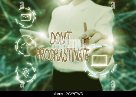 Text sign showing Don T Procrastinate, Business idea Avoid delaying or slowing something that must be done Lady In Uniform Holding Tablet In Hand Virt Stock Photo