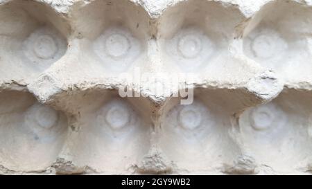 Paper trays empty egg containers. Close-up, top view. Stock Photo