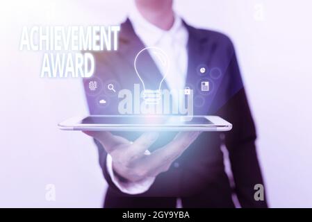 Text caption presenting Achievement Award, Concept meaning recognizes worthy and outstanding achievement in job skill Lady In Suit Presenting Mobile D Stock Photo