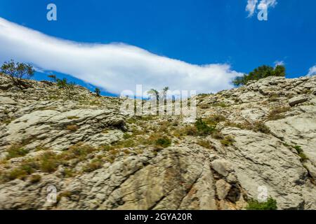 Driving through the beautiful landscape in Croatia is fast and blurry. Stock Photo