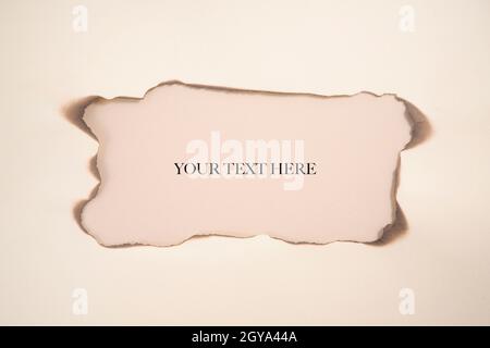 a space with the burnt edges of a card Stock Photo