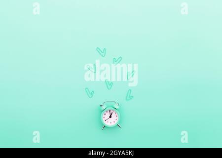 Back to school, office work conceptual flat lay with alarm clock, clips and copy space area for text. Concept of time to work, be in time and wake up Stock Photo