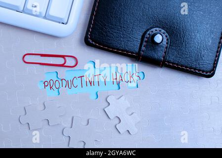 Text showing inspiration Productivity Hacks, Word Written on tricks that you get more done in the same amount of time Building An Unfinished White Jig Stock Photo
