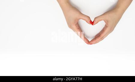 Womans Hands Shaped To Hold Copy Space Between Them Stock Photo