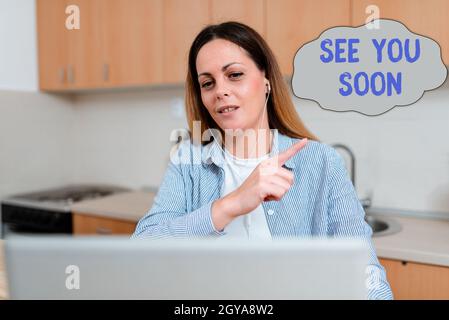 Handwriting text See You Soon, Concept meaning used for saying goodbye to someone and going to meet again soon Abstract Working At Home Ideas, Interio Stock Photo