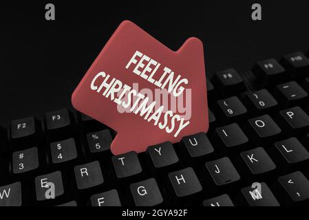 Text sign showing Feeling Christmassy, Business approach Resembling or having feelings of Christmas festivity Inputting Important Informations Online, Stock Photo