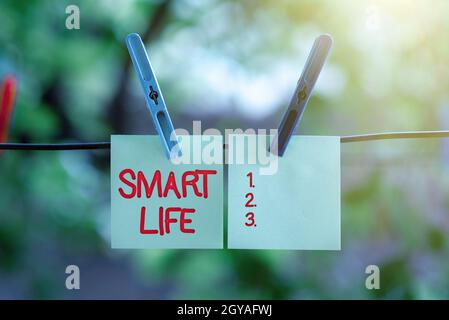 Conceptual caption Smart Life, Business showcase technology that works to make living enjoyable and comfortable Thinking New Bright Ideas Renewing Cre Stock Photo