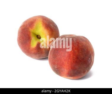 two ripe red peaches isolated on white background Stock Photo
