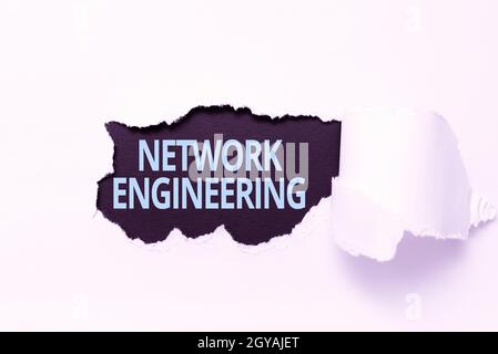 Writing displaying text Network Engineering, Word Written on field concerned with internetworking service requirement Tear on sheet reveals background Stock Photo