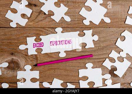 Conceptual caption Exceed Expectations, Business idea able to surpass or beyond the acceptable performance Building An Unfinished White Jigsaw Pattern Stock Photo