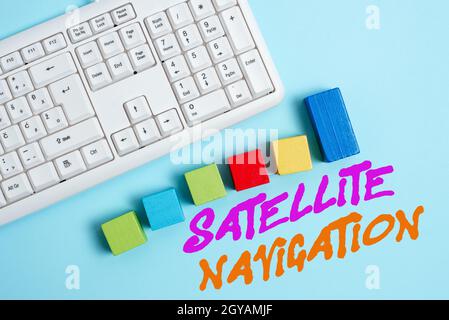 Sign displaying Satellite Navigation, Business idea system providing autonomous geospatial positioning Stack of Sample Cube Rectangular Boxes On Surfa Stock Photo