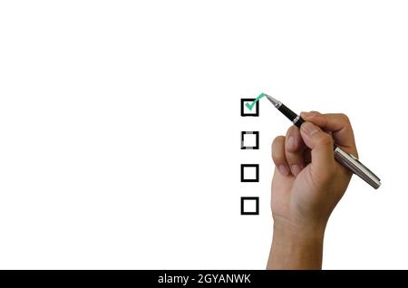 hand holding a green checkmark on a white background Stock Photo