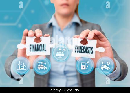 Text sign showing Financial Forecasts, Business idea estimate of future financial outcomes for a company Business Woman Holding Jigsaw Puzzle Piece Un Stock Photo