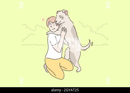 Child playing with dog concept. Young boy child kid owner cartoon character hugging embracing with happy pet puppy licking face in park outside. Summe Stock Photo