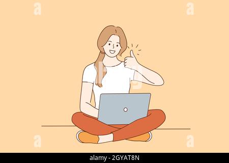 Freelance, Online distant work, internet technologies concept. Happy smiling woman cartoon character sitting on floor with legs crossed working on lap Stock Photo