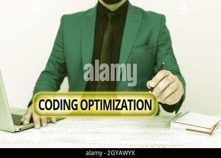 Conceptual caption Coding Optimization, Word for method of code modification to improve code quality Remote Office Work Online Presenting Business Pla Stock Photo