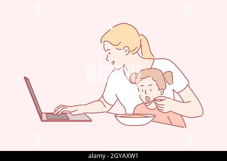Business, quarantine, coronavirus, motherhood, childhood concept. Busy young mom freelancer working home with laptop feeding hungry child kid daughter Stock Photo