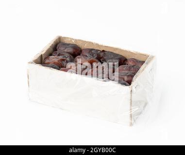 Full paper white cardboard box dates on a white background, Mazafati grade Stock Photo