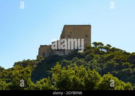 hermitage on the top of a hill above a Mediterranean forest Stock Photo
