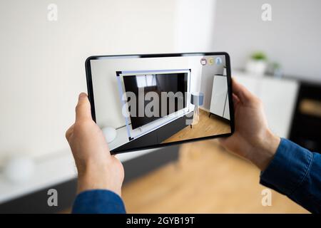AR Smartphone Designer Application. Augmented Reality TV Stock Photo