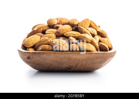 Peeled almonds nuts isolated on white background. Stock Photo
