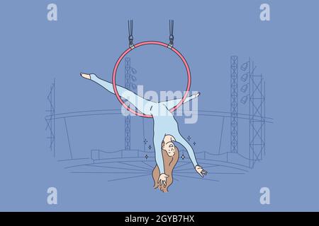Perfomance, sport, art, acrobatics, air concept. Young professional woman girl acrobat athlete gymnast character perfoming aerial tricks on flying cir Stock Photo