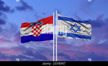 Israel and Croatia two flags on flagpoles and blue cloudy sky Stock Photo