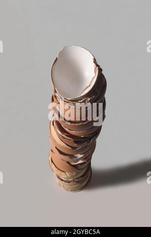 top view of egg shells piled up on white background Stock Photo