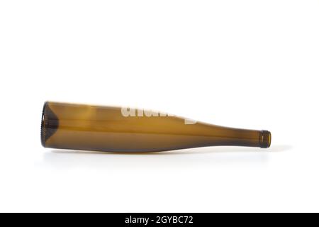 brown glass bottle lying on white background Stock Photo
