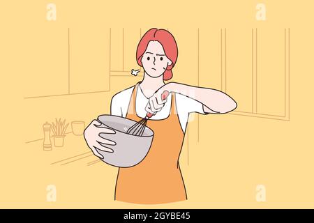 Tiredness of cooking at home concept. Sad frustrated irritated pretty girl cartoon character in apron standing cooking and feeling tired of housework Stock Photo