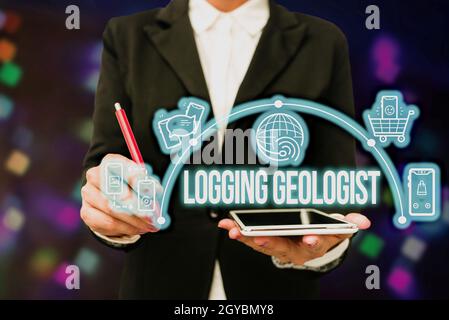 Handwriting text Logging Geologist, Business approach Layout and execution of definition diamond drill programs Lady In Uniform Holding Tablet In Hand Stock Photo
