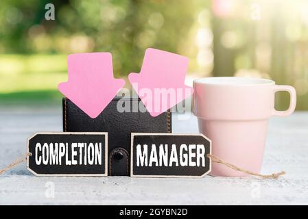 Hand writing sign Completion Manager, Word for oversees all aspects of plan management to met goals Outdoor Relaxation Experience And Ideas, Coffee Sh Stock Photo