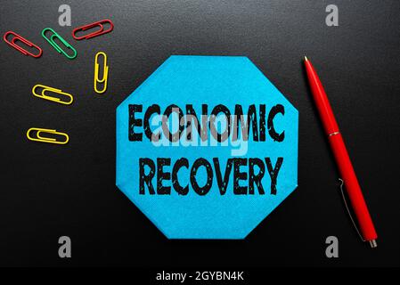 Text sign showing Economic Recovery, Business showcase rise of business activity signaling the end of a recession Thinking New Bright Ideas Renewing C Stock Photo