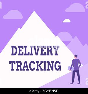 Hand writing sign Delivery Tracking, Business approach the process of localizing shipping containers and mails Gentleman In Suit Standing Holding Note Stock Photo