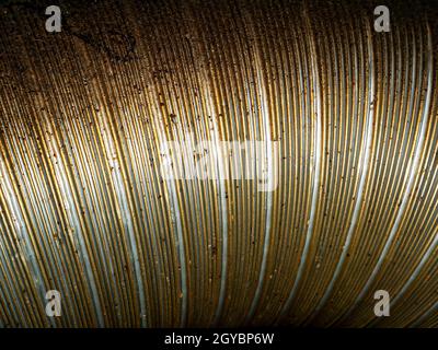 Aluminum corrugation of industrial air ventilation system. Aluminum corrugation. Industrial air ventilation system. Air duct pipeline. Background imag Stock Photo