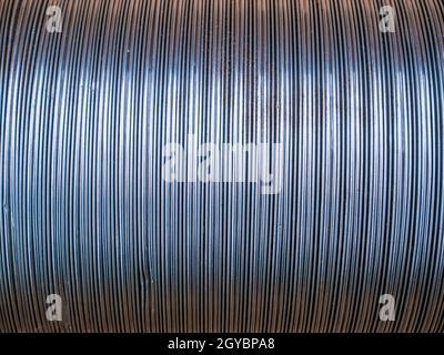 The texture of the metal corrugated ventilation pipe. Metal corrugation texture. Ventilation pipe. Hood. Embossed metal. Iron. Air conditioning duct. Stock Photo