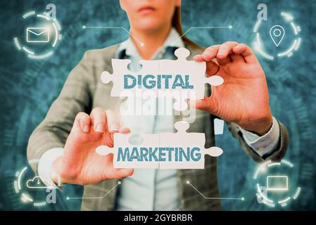 Writing displaying text Digital Marketing, Business showcase marketing of products using digital technologies Business Woman Holding Jigsaw Puzzle Pie Stock Photo
